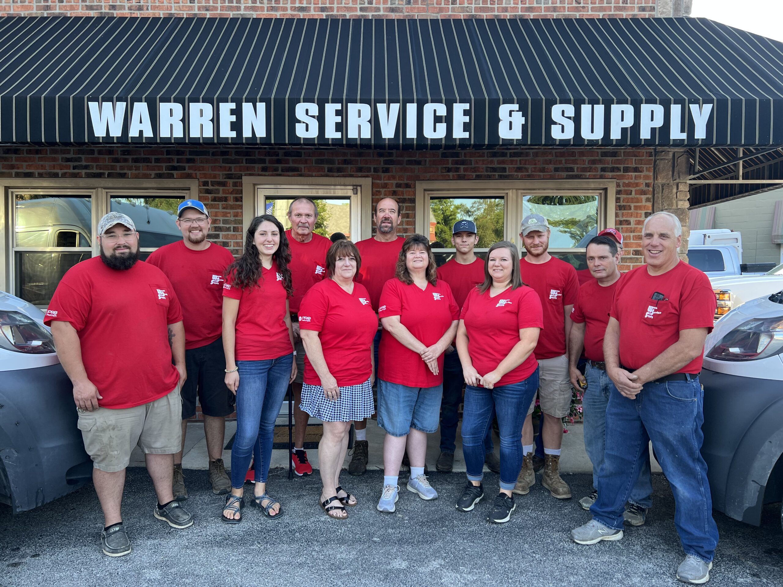 Warren Service and Supply staff and building